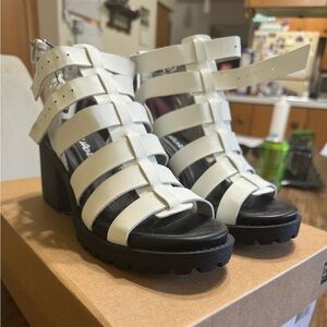 Women’s size 5 strappy wedge sandal.  Super cute and comfortable
